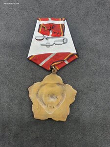 Подскажите,что за Китайская медаль или орден?